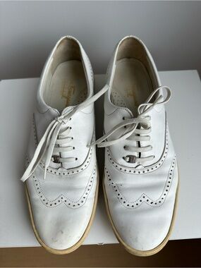 Authentic Salvatore Ferragamo white leather tennis shoes